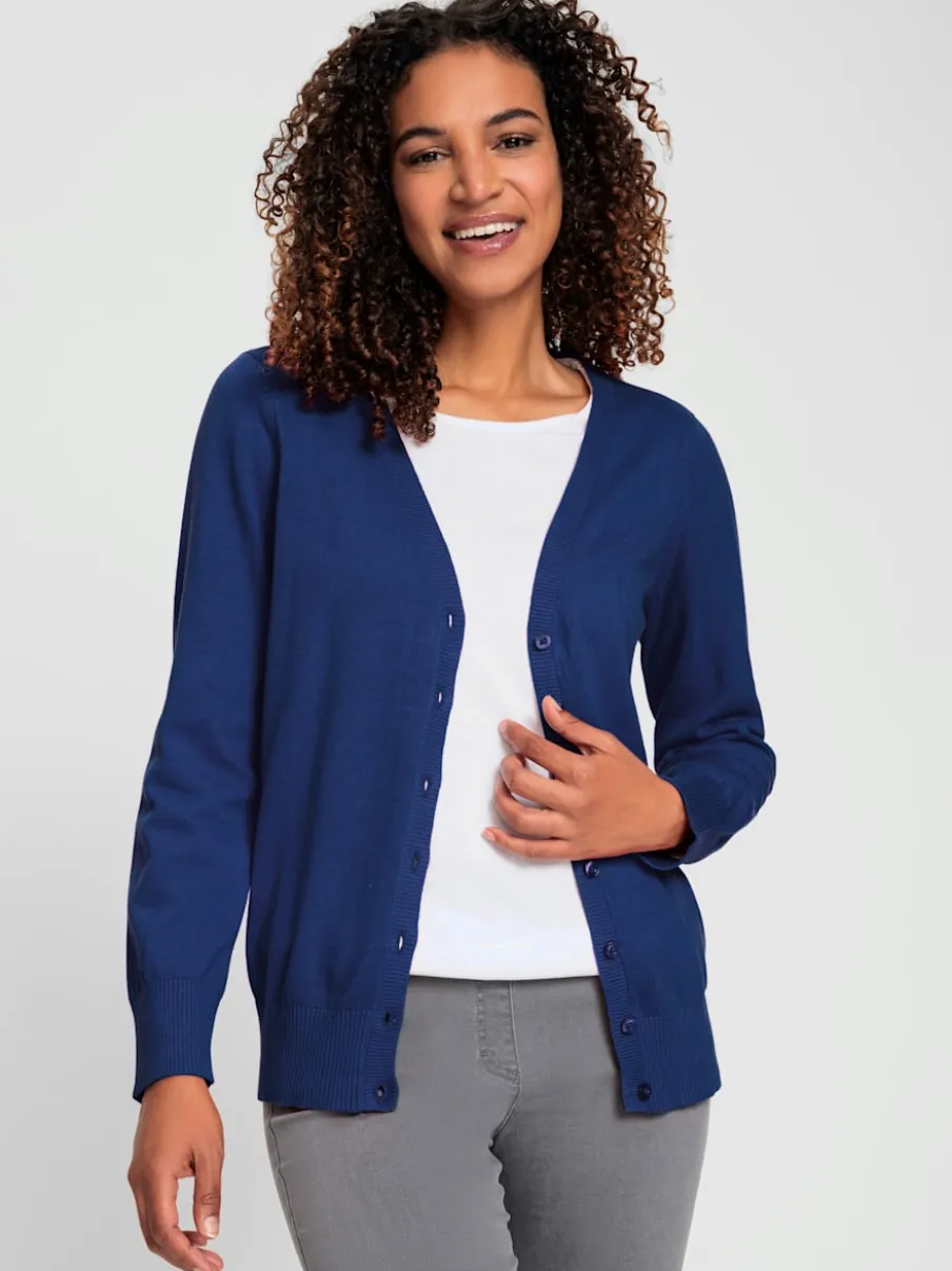Veste en tricot doux avec col en V boutonné