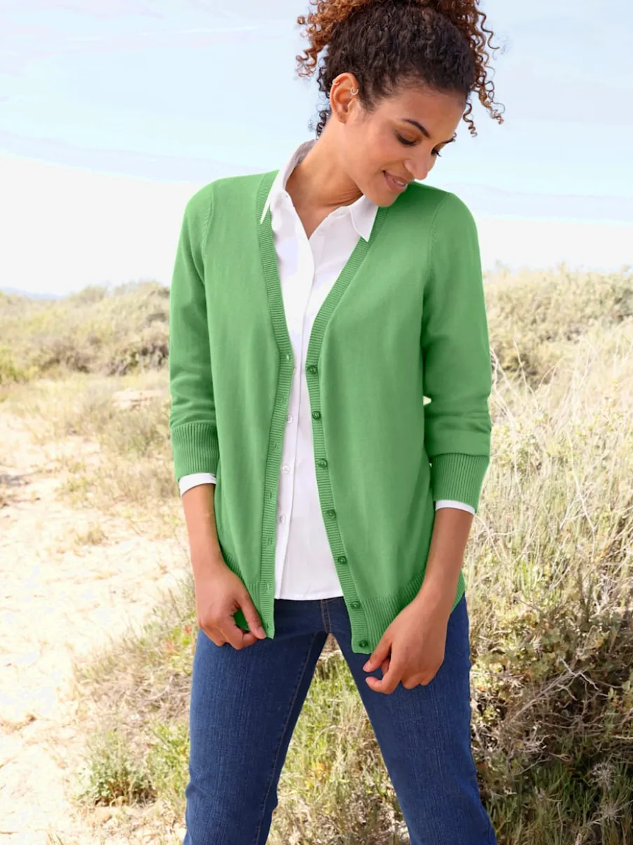 Veste en tricot doux avec col en V boutonné