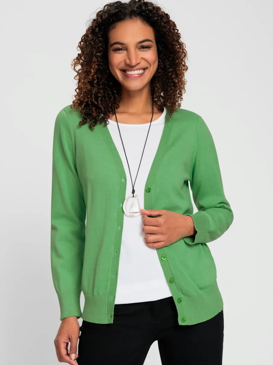 Veste en tricot doux avec col en V boutonné