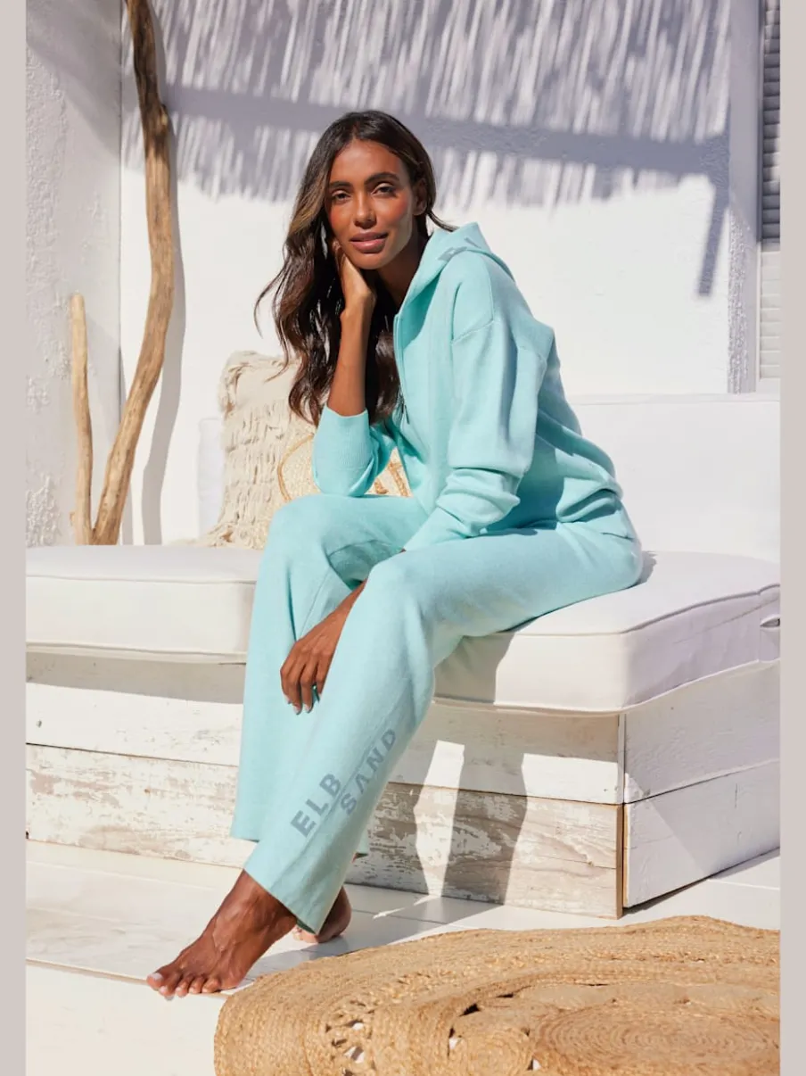 Veste en tricot doux à manches longues avec capuche