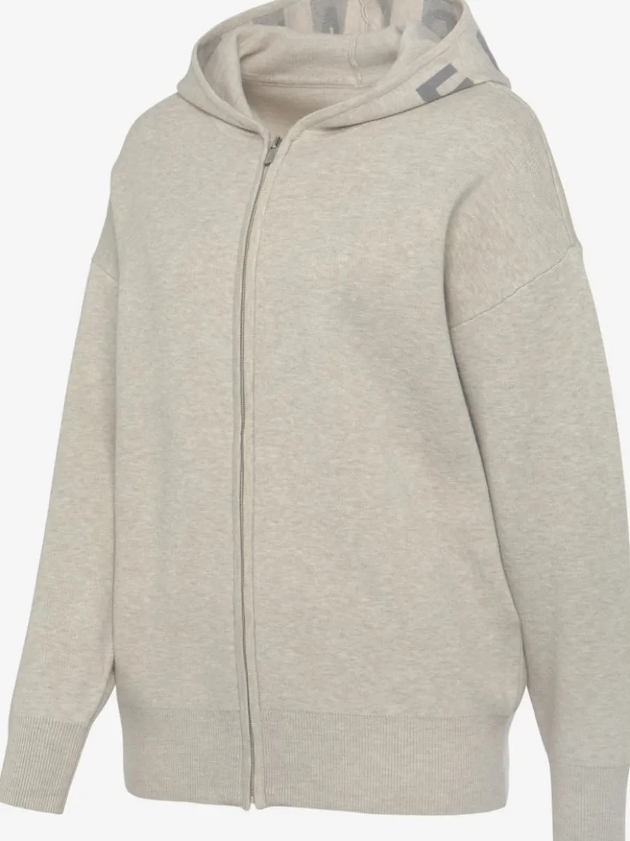 Veste en tricot doux à manches longues avec capuche