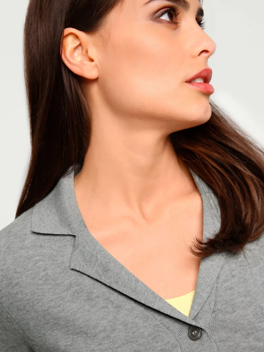 Veste en tricot fin avec poches plaquées et boutons