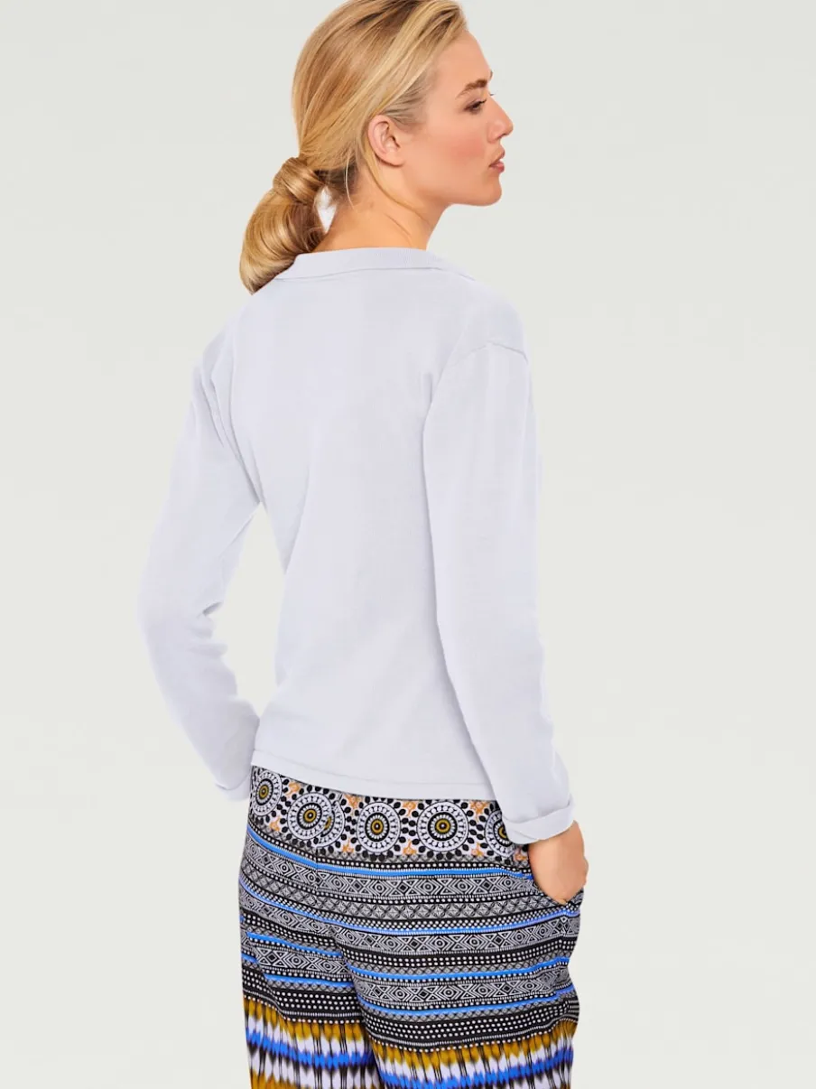 Veste en tricot fin avec poches plaquées et boutons