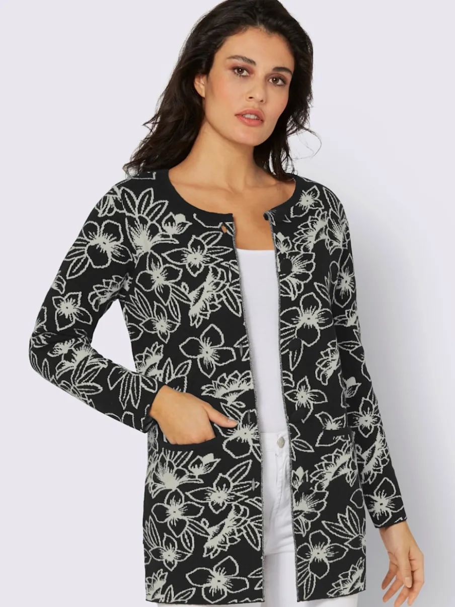Veste en tricot jacquard aux motifs floraux avec poches