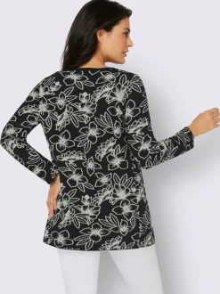Veste en tricot jacquard aux motifs floraux avec poches