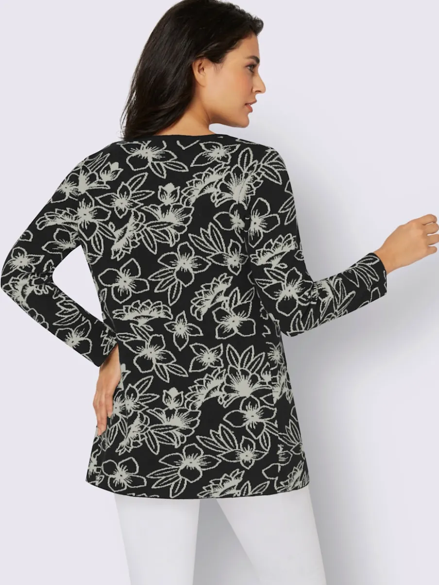 Veste en tricot jacquard aux motifs floraux avec poches