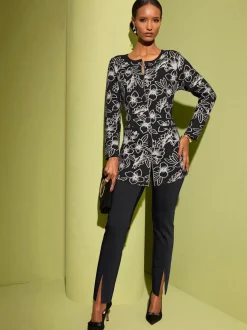 Veste en tricot jacquard aux motifs floraux avec poches