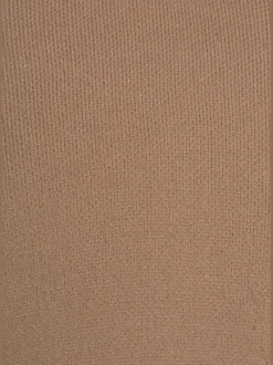 Veste en tricot long avec col châle et poches ouvertes
