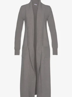 Veste en tricot long avec col châle et poches ouvertes
