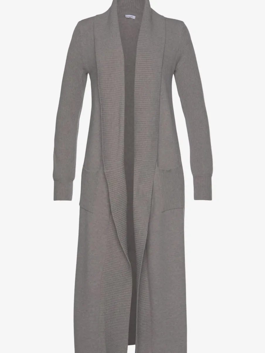 Veste en tricot long avec col châle et poches ouvertes