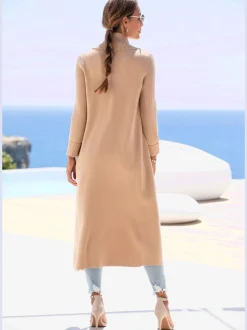 Veste en tricot long avec col châle et poches ouvertes