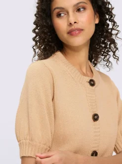 Veste en tricot manches ballon avec patte de boutonnage et encolure ronde