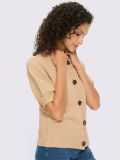 Veste en tricot manches ballon avec patte de boutonnage et encolure ronde