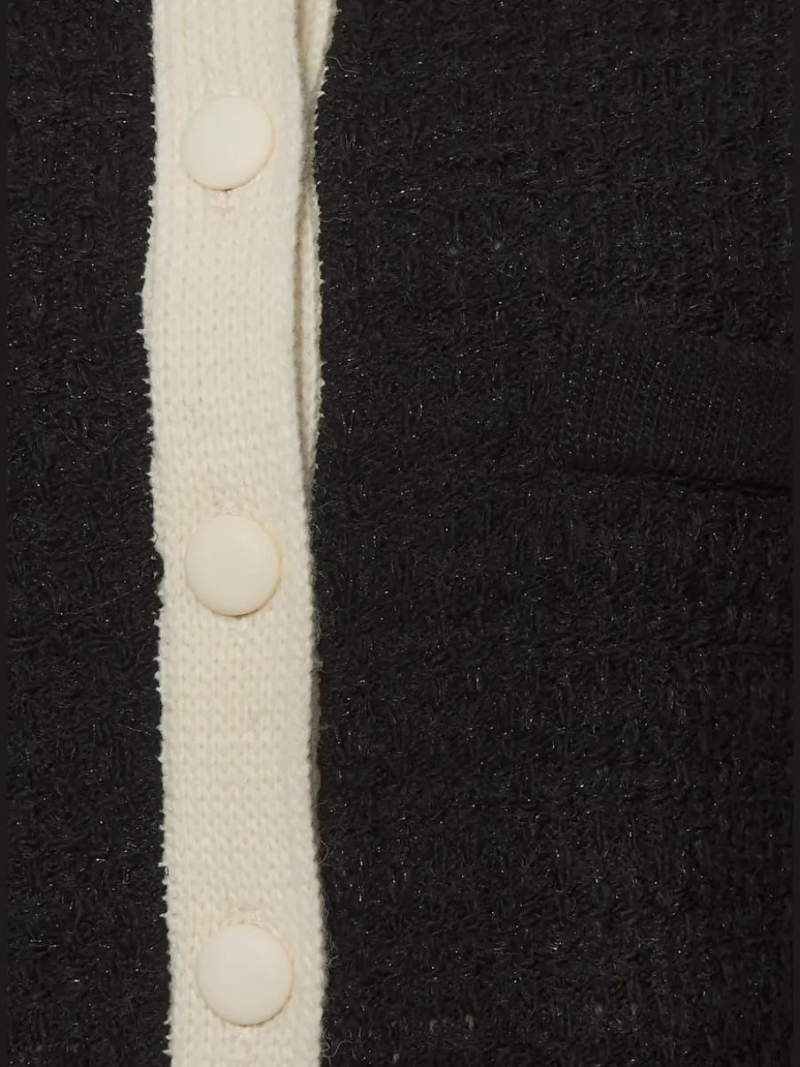 Veste en tricot à manches longues et poches décoratives