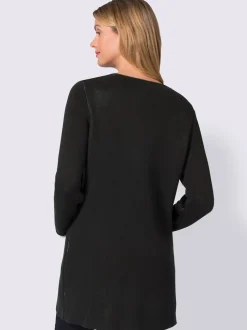 Veste en tricot à manches longues avec poches pratiques