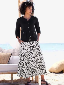Veste en tricot milanais à boutons fantaisie et poches