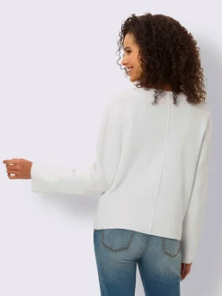 Veste en tricot milanais à boutons fantaisie et poches