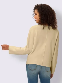 Veste en tricot milanais à boutons fantaisie et poches