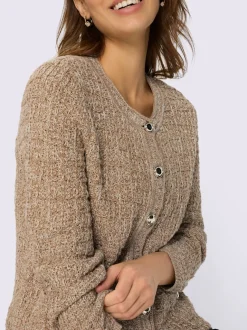 Veste en tricot motif brillant encolure ronde et poches