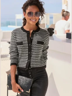 Veste en tricot à motifs à carreaux avec manches longues et poches décoratives