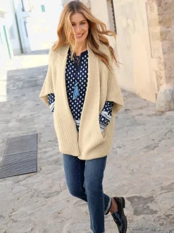 Veste en tricot ouverte avec poches et look oversize