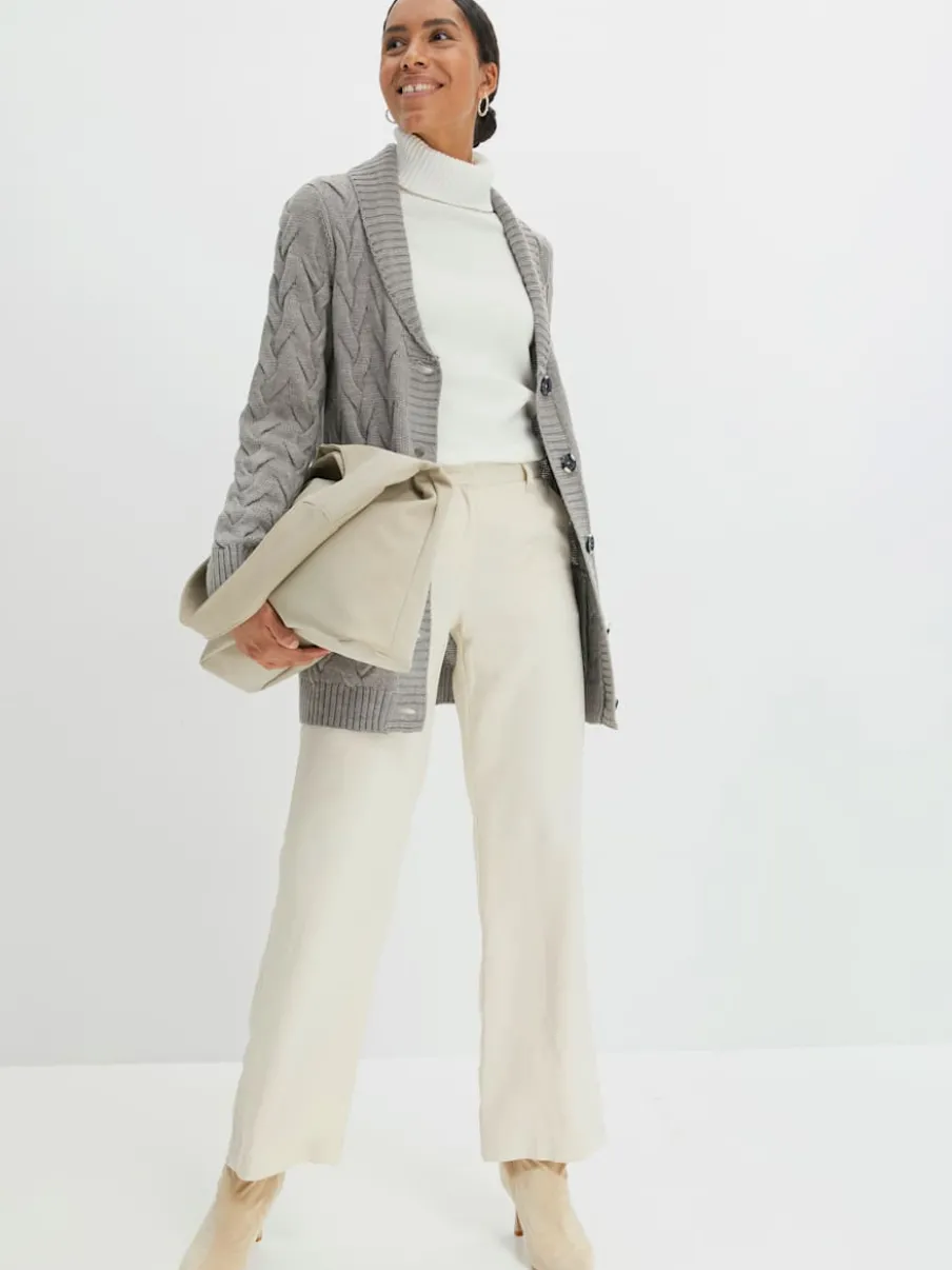 Veste en tricot superbe motif torsadé