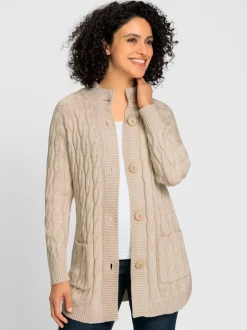 Veste en tricot torsadé avec col montant et poches
