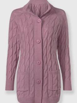 Veste en tricot torsadé avec col montant et poches