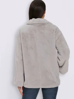 Veste imitation fourrure avec col montant et manches longues