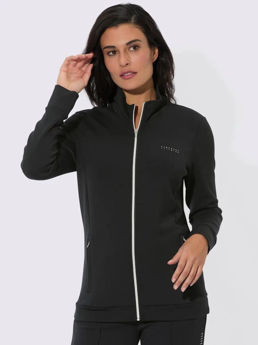 Veste interlock à col montant et manches longues intégrant poches.