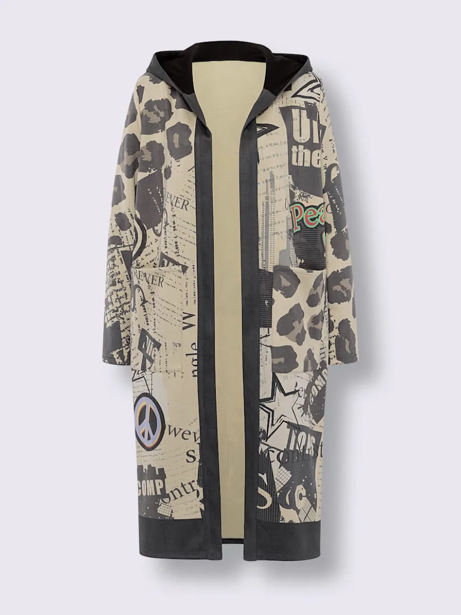 Veste légère à capuche avec motifs graphiques et poches.