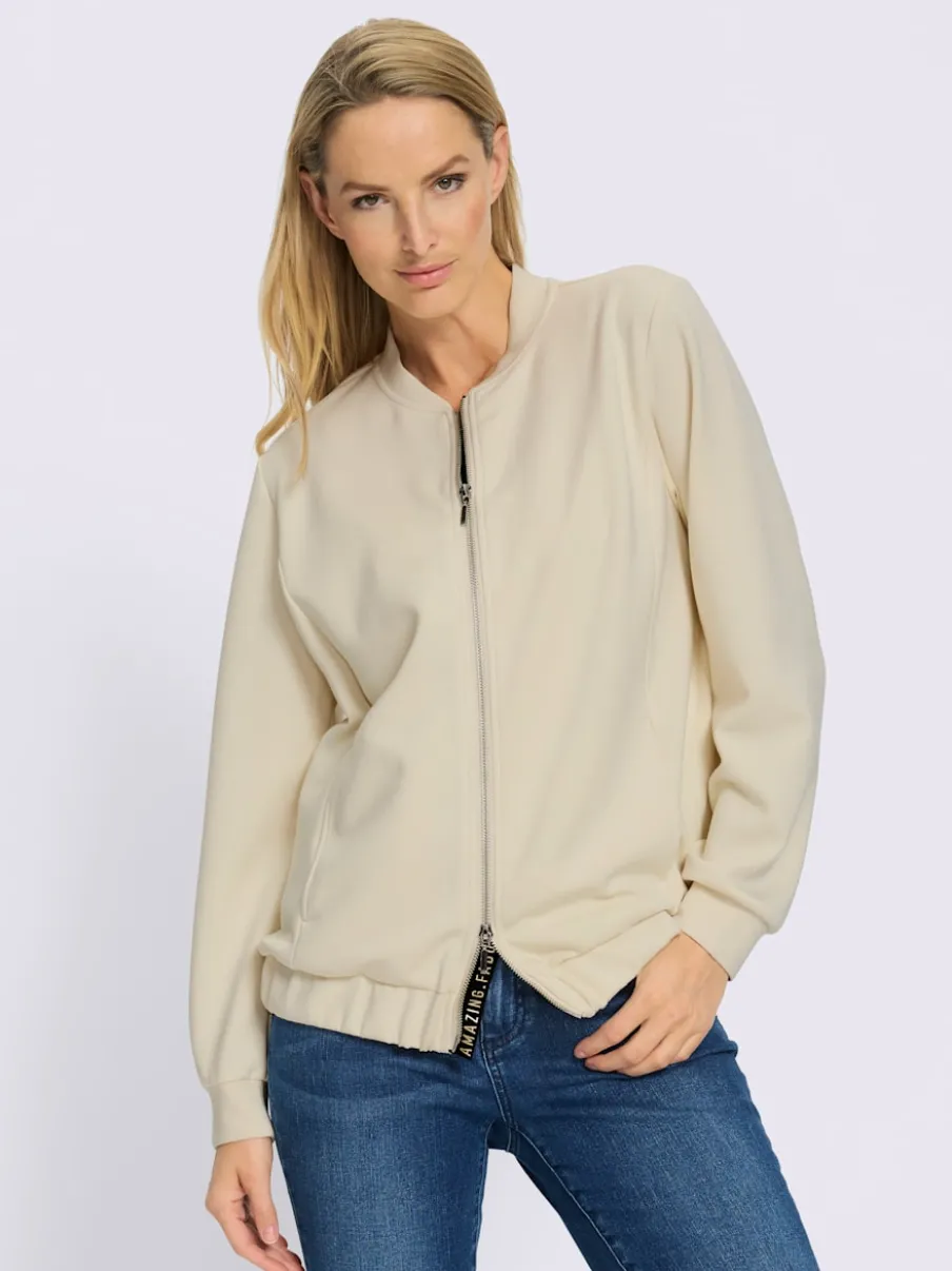 Veste légère à col montant avec glissière et bords-côtes extensibles