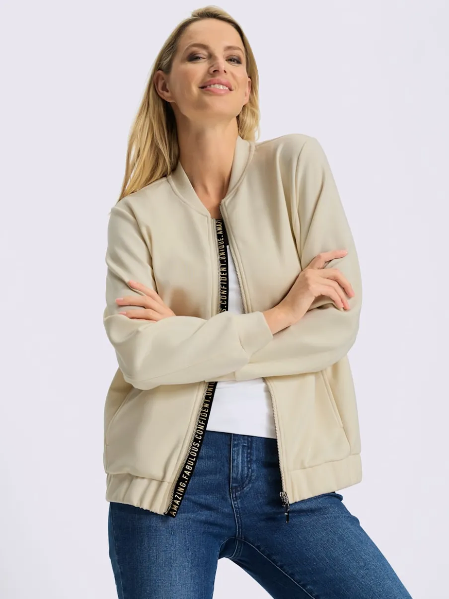 Veste légère à col montant avec glissière et bords-côtes extensibles