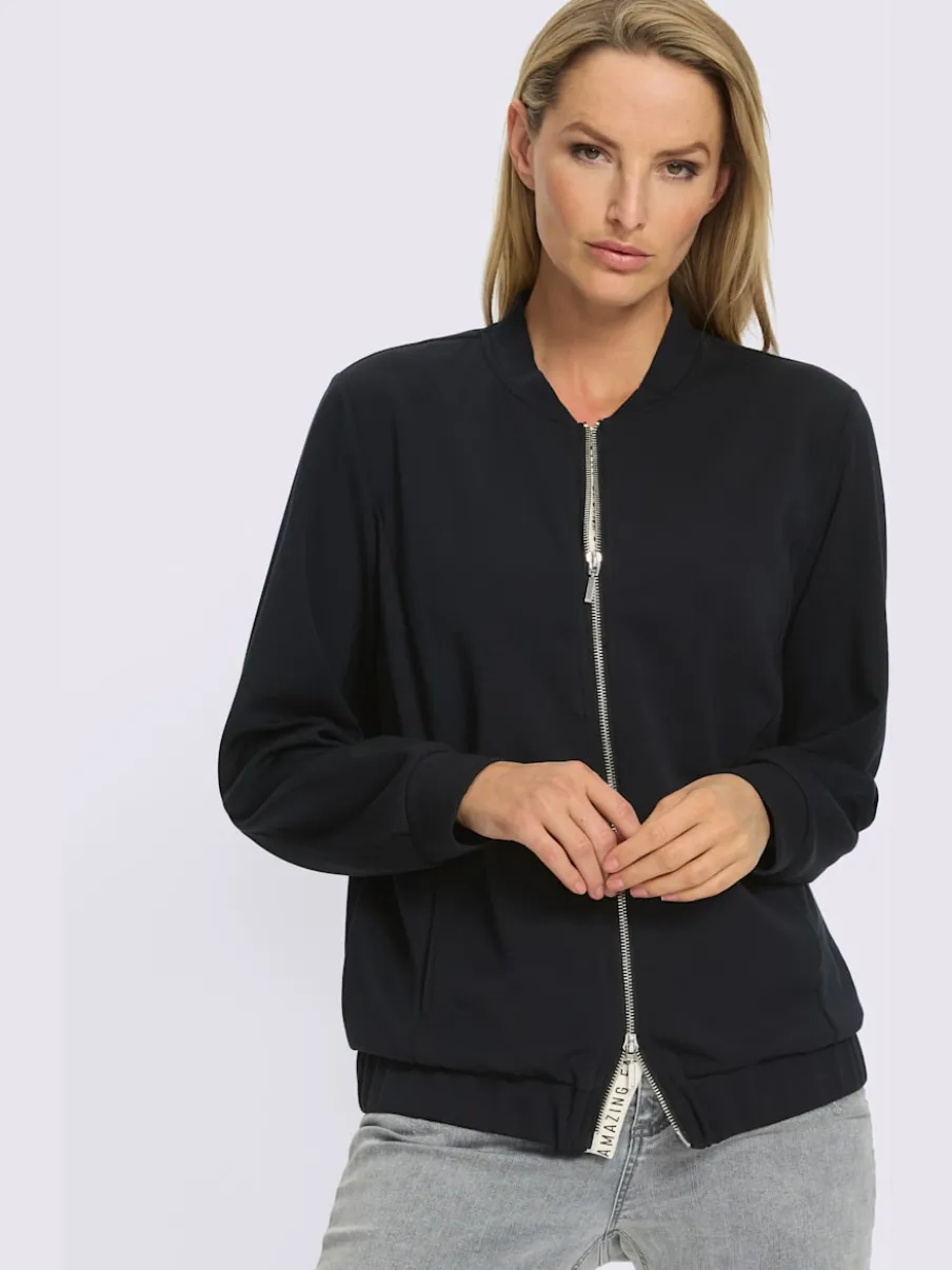 Veste légère à col montant avec glissière et bords-côtes extensibles