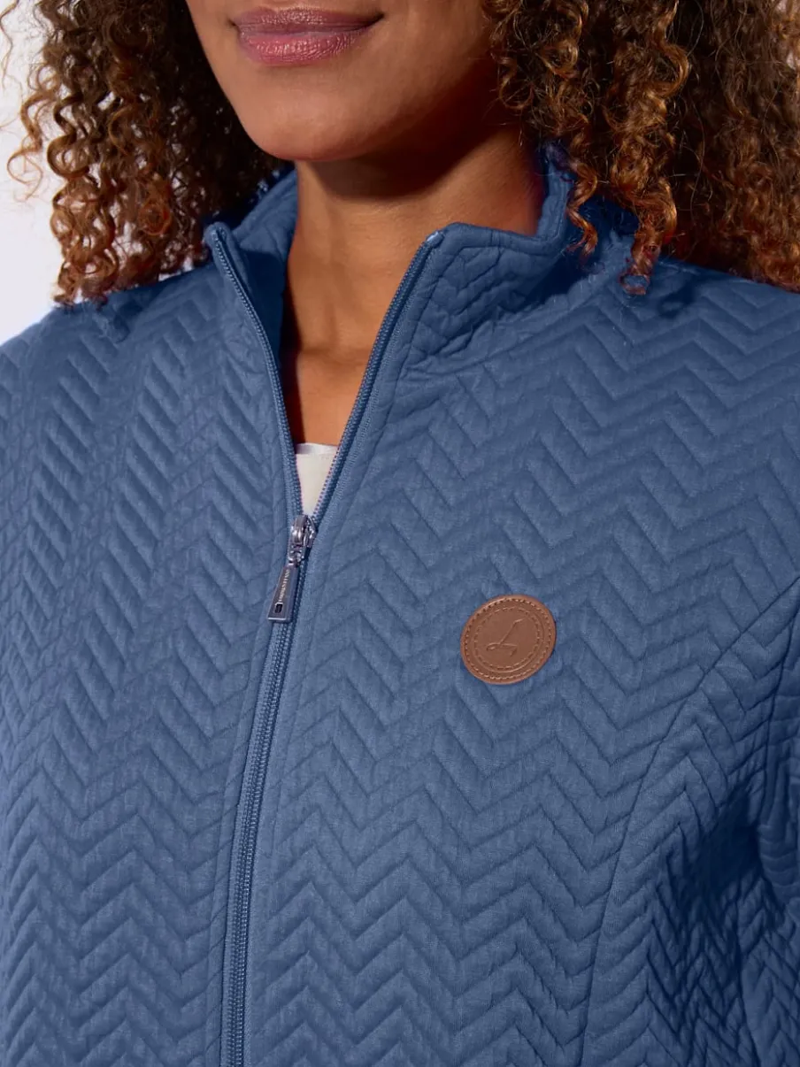 Veste légère à col montant avec motif jacquard et glissière