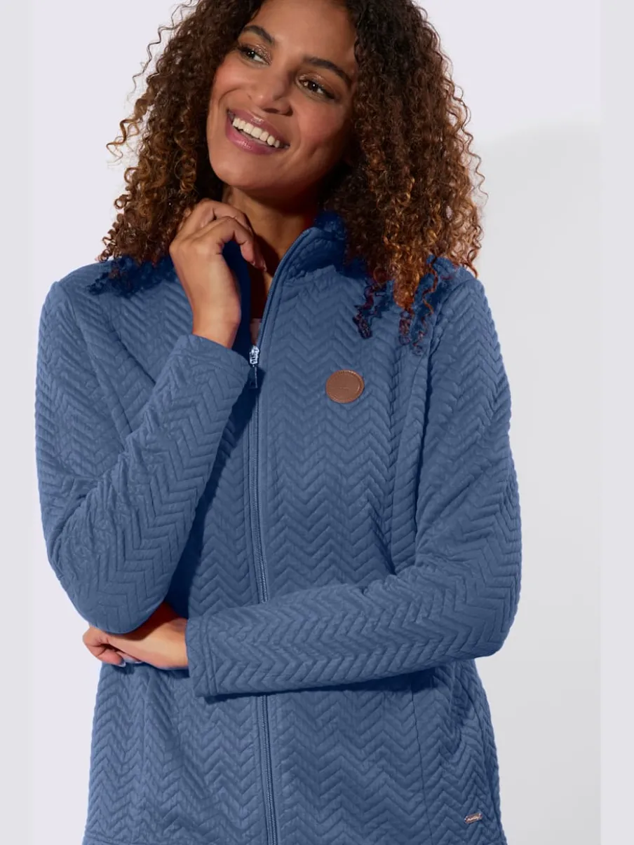 Veste légère à col montant avec motif jacquard et glissière