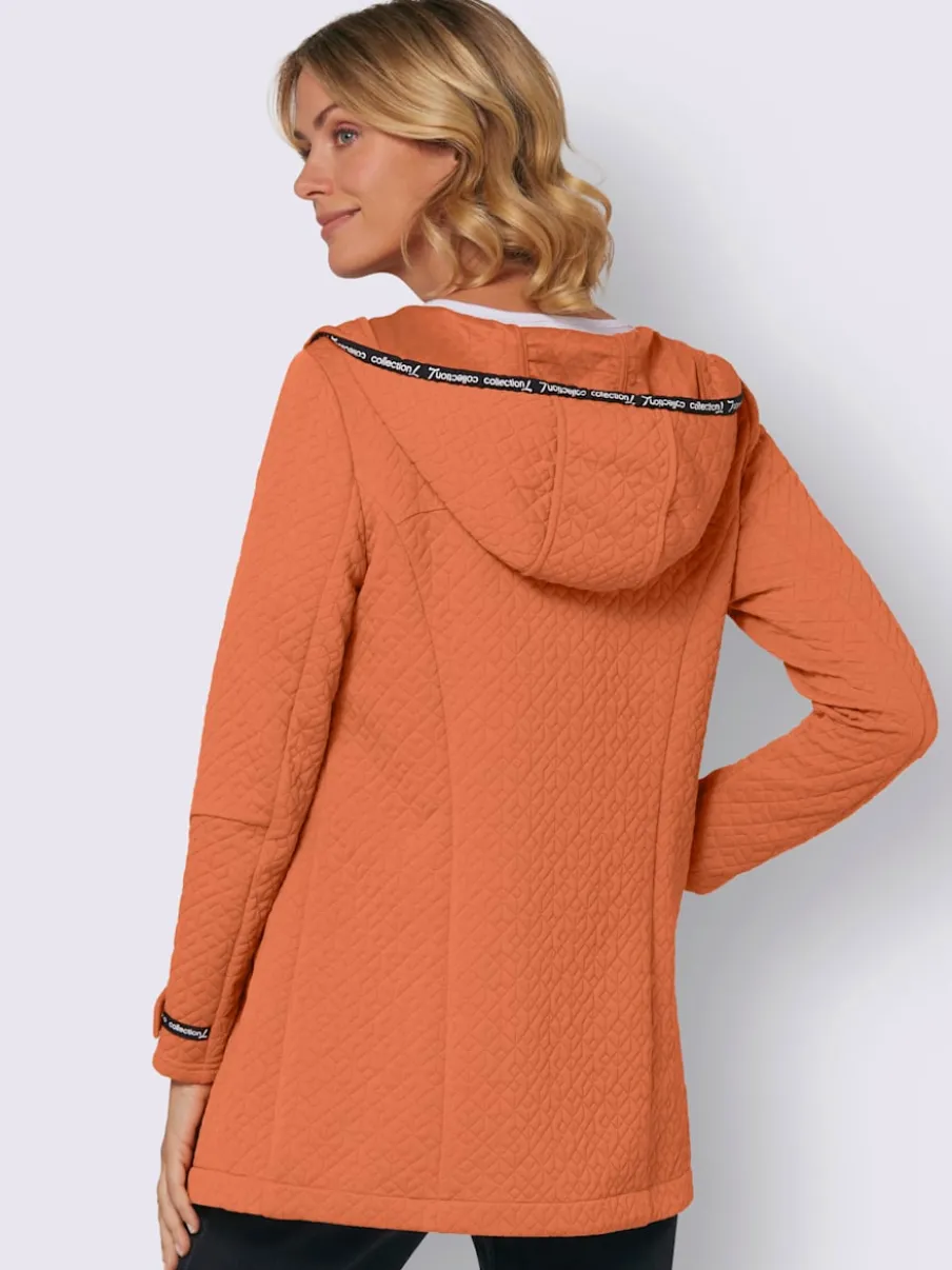 Veste légère longue avec capuche et poches zippées