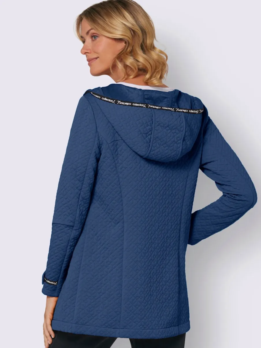 Veste légère longue avec capuche et poches zippées
