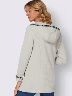 Veste légère longue avec capuche et poches zippées