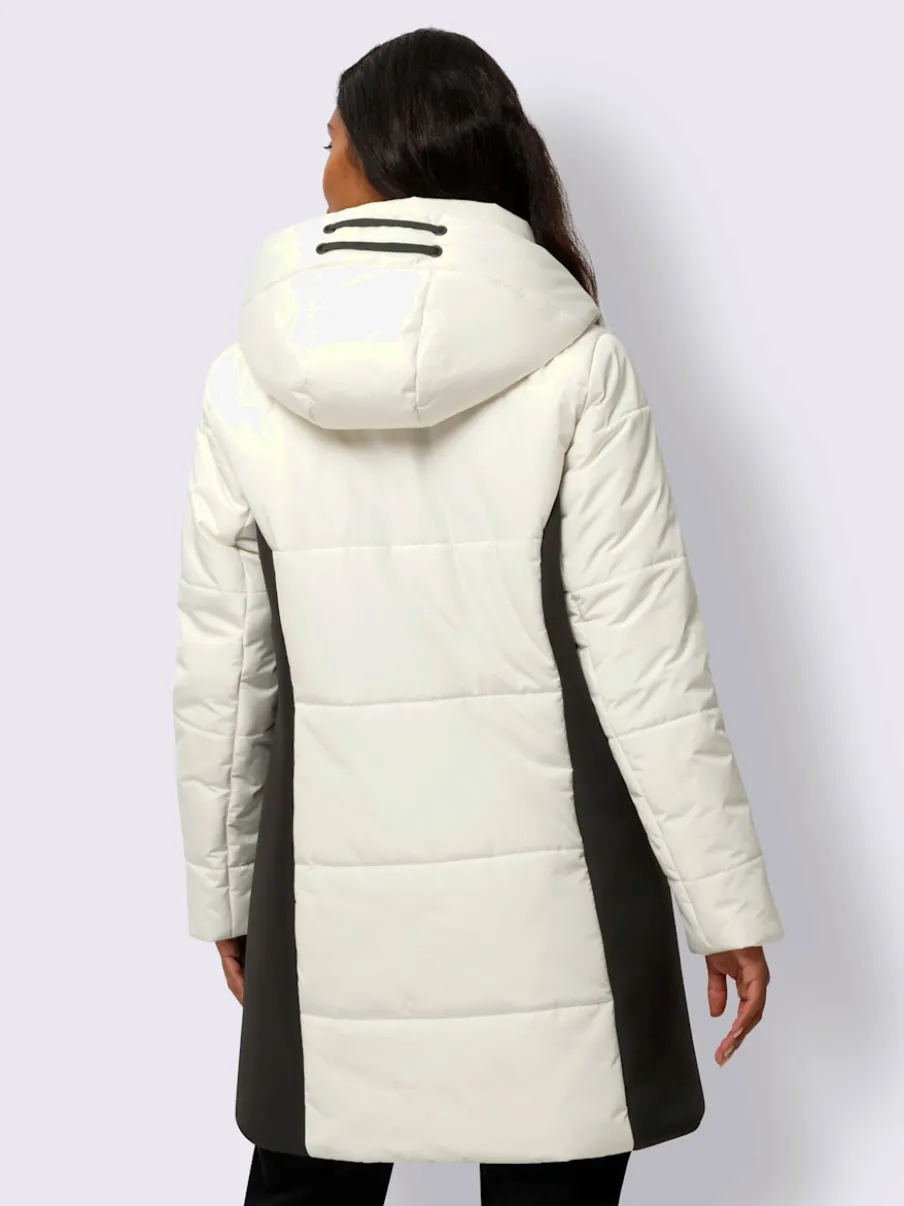 Veste longue avec empiècements latéraux et capuche ajustable