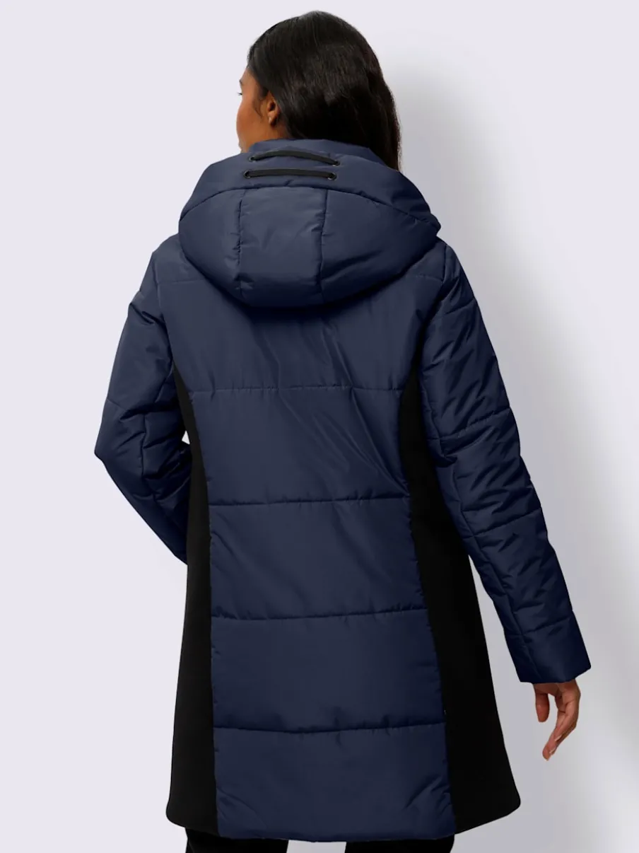 Veste longue avec empiècements latéraux et capuche ajustable