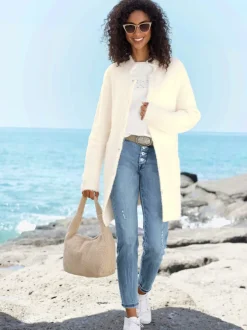 Veste longue en tricot avec col montant et poches plaquées