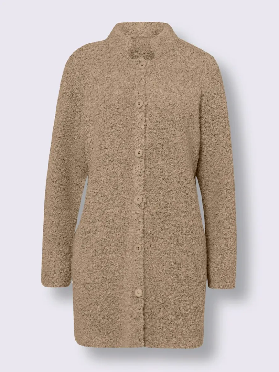 Veste longue en tricot avec col montant et poches plaquées