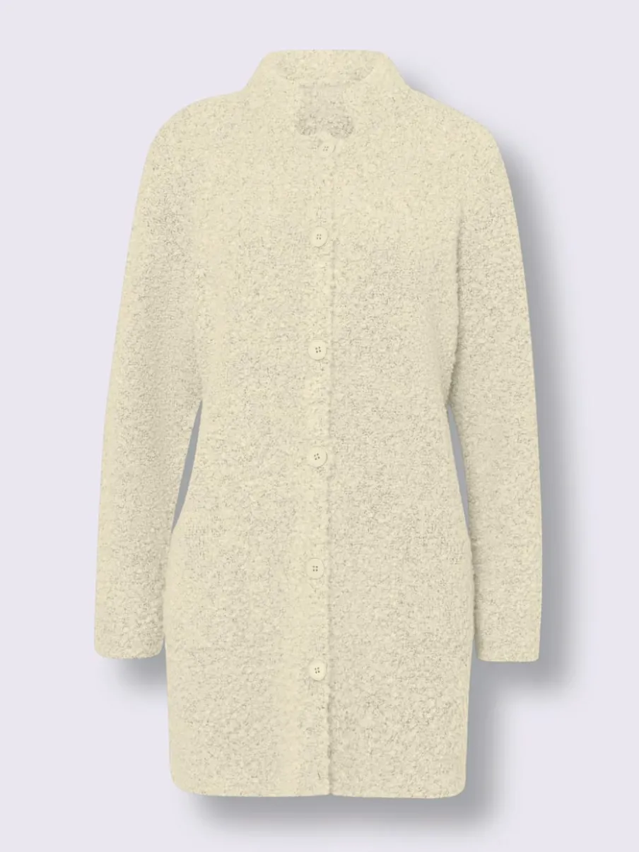 Veste longue en tricot avec col montant et poches plaquées