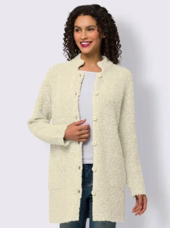 Veste longue en tricot avec col montant et poches plaquées