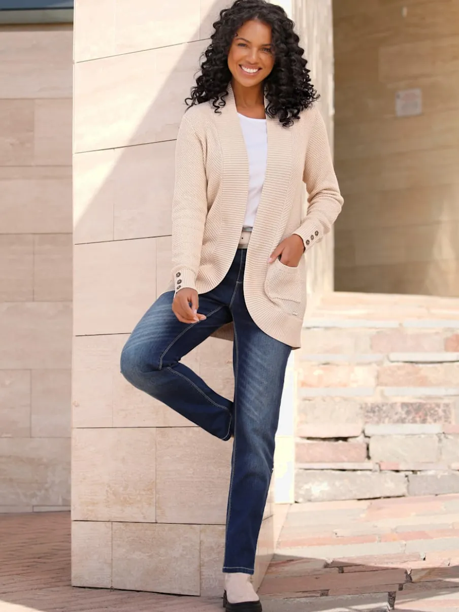 Veste longue en tricot avec poches et boutons côtelés