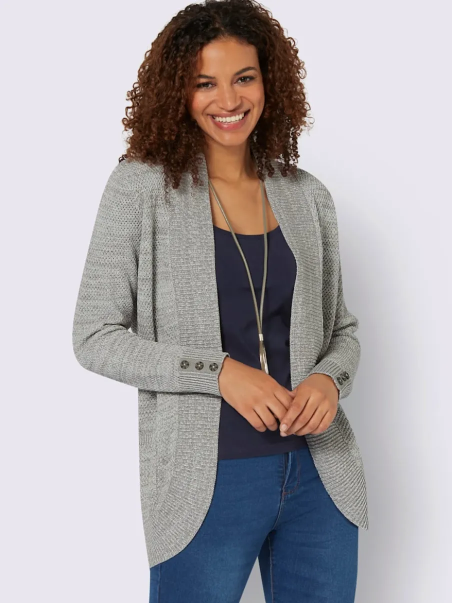 Veste longue en tricot avec poches et boutons côtelés