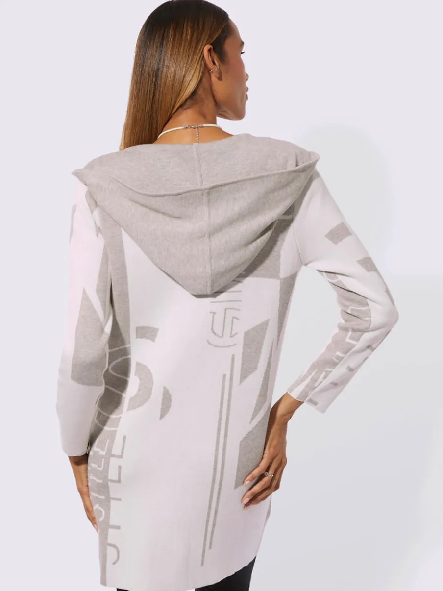 Veste longue en tricot à capuche avec motif graphique et poches