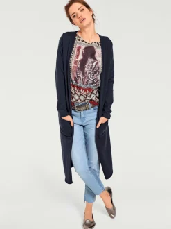 Veste longue en tricot à col montant avec poches et manches longues