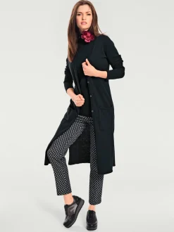 Veste longue en tricot à col montant avec poches et manches longues